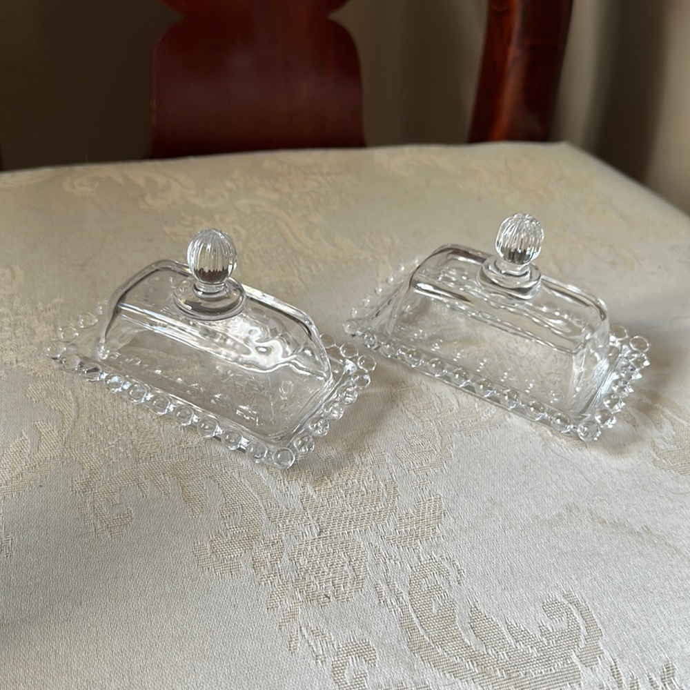 Adorable pair of vintage candlewick glass covered miniature butter dish set
